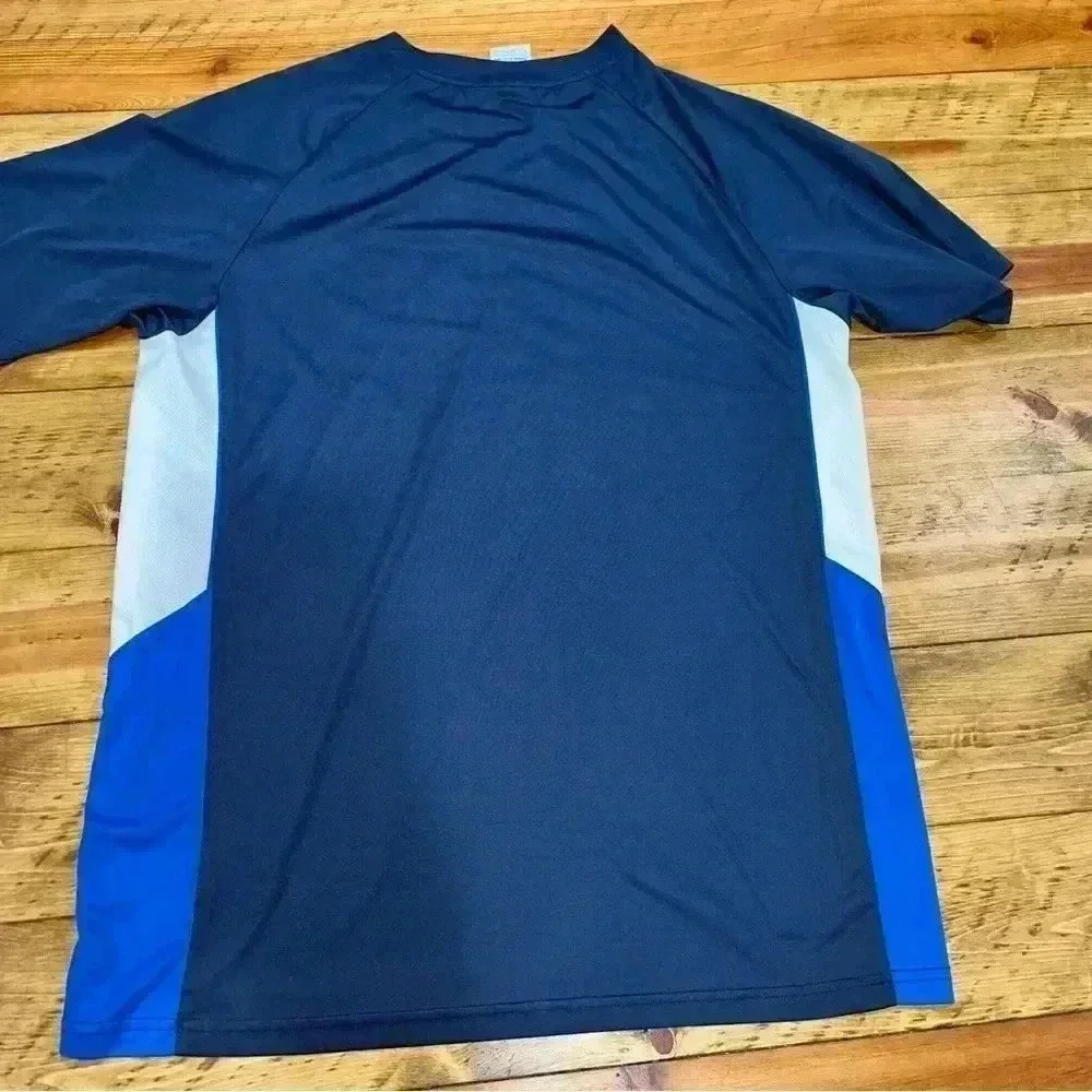 Nike Dri fit vented sides shirt sleeve shirt with Nike emblem on chest